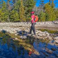 Hiker along the shoreline of Georgian Bay | Pete Heck